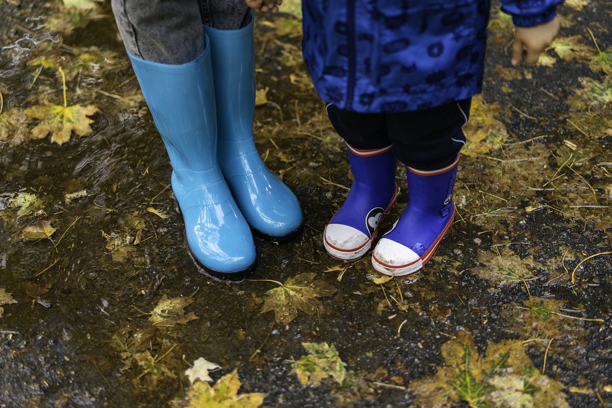 Two People in Rubber Boots 